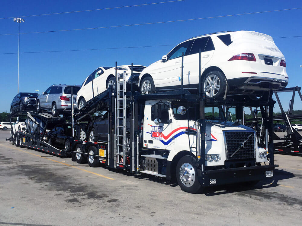 Car Being Loaded Onto A Transport Trailer Michigan